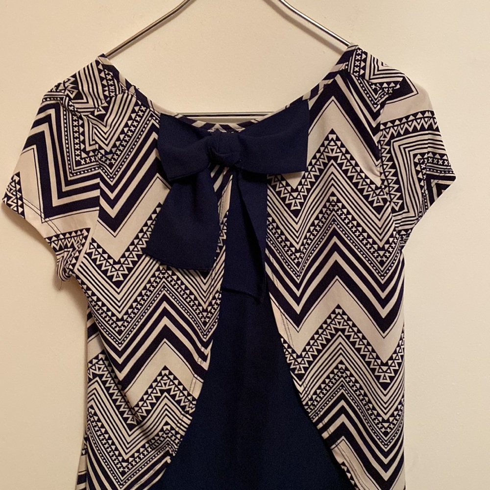 Top with bow on back